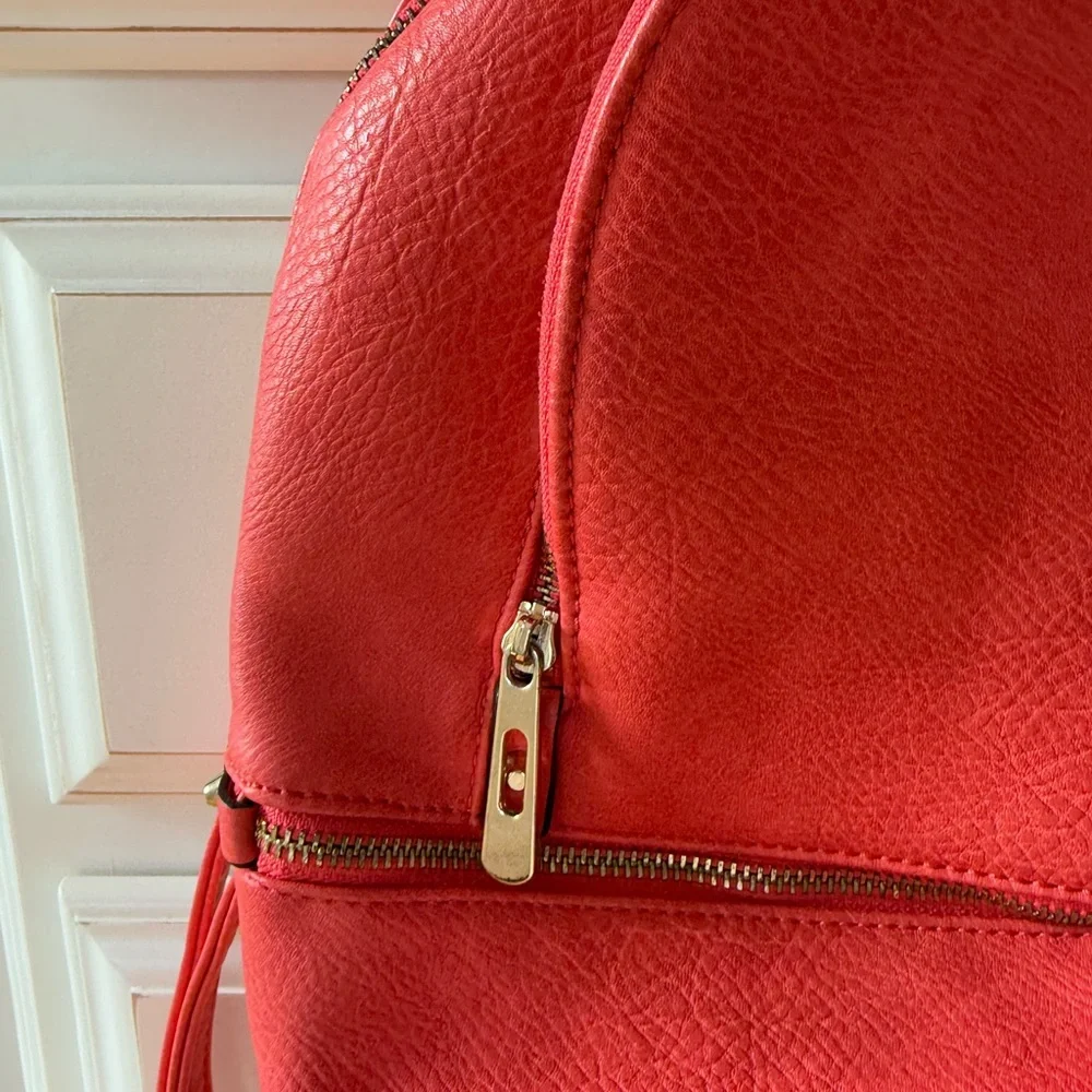 Salmon colored Real Italian leather mini backpack with gold hardware